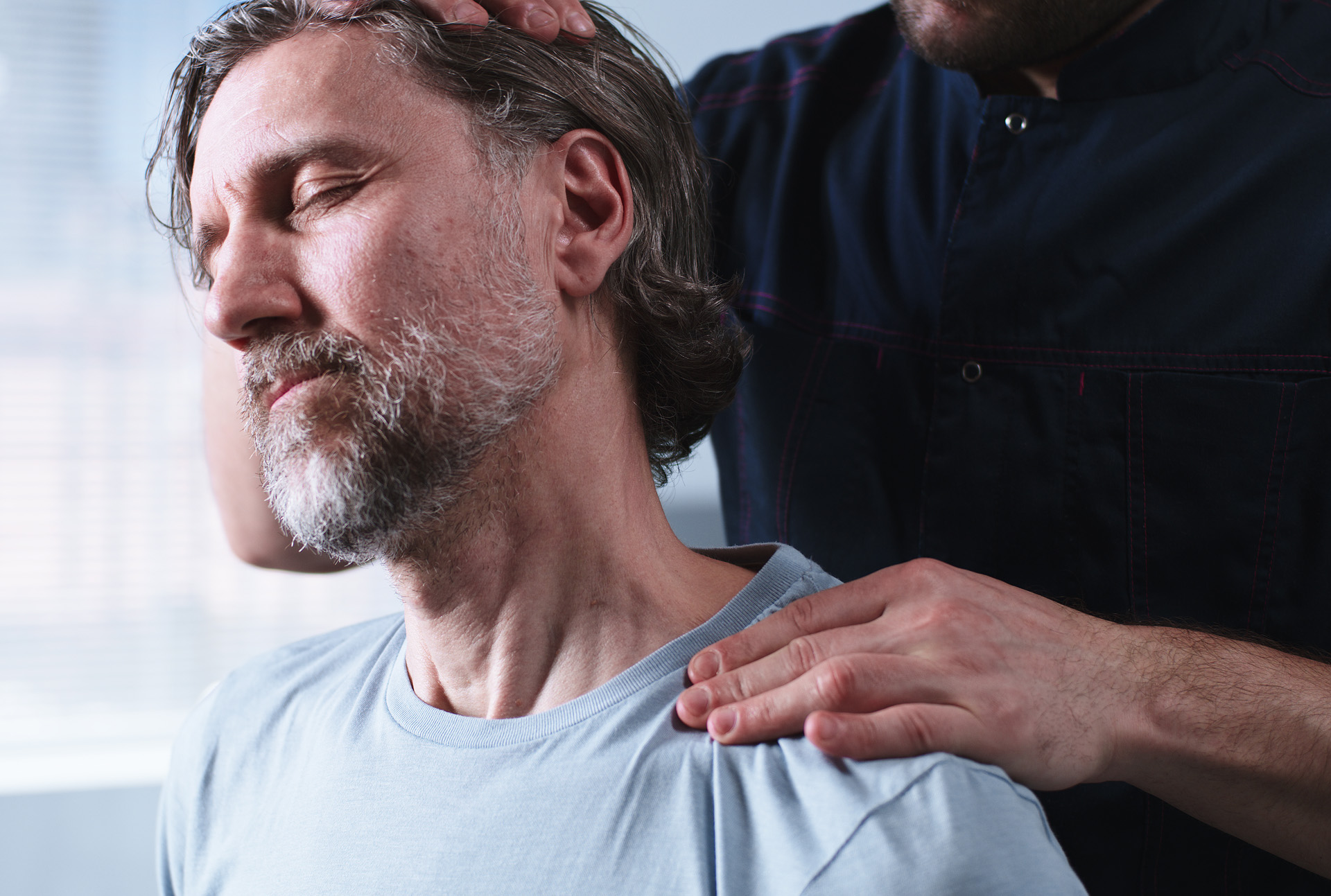 Chiropractor Adjusting Neck